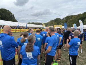 team members from itw gse cheering for runners at dhl relay race